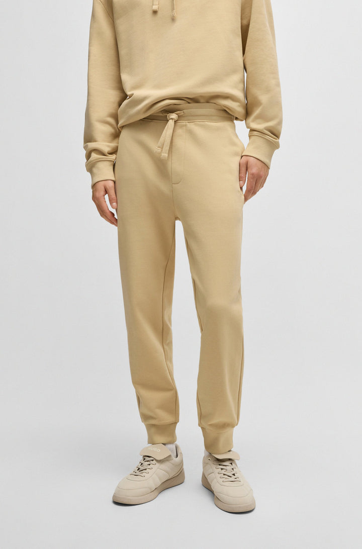 HUGO Jogging Pants Regular Fit - DAYOTE232 50489617Concorde Fashion#color_beige-285