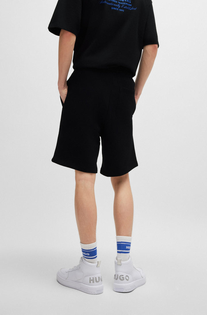 HUGO Shorts Loose Fit in Cotton - NOMARIO 10257685 01-50510728- Concorde Fashion#color_black-001