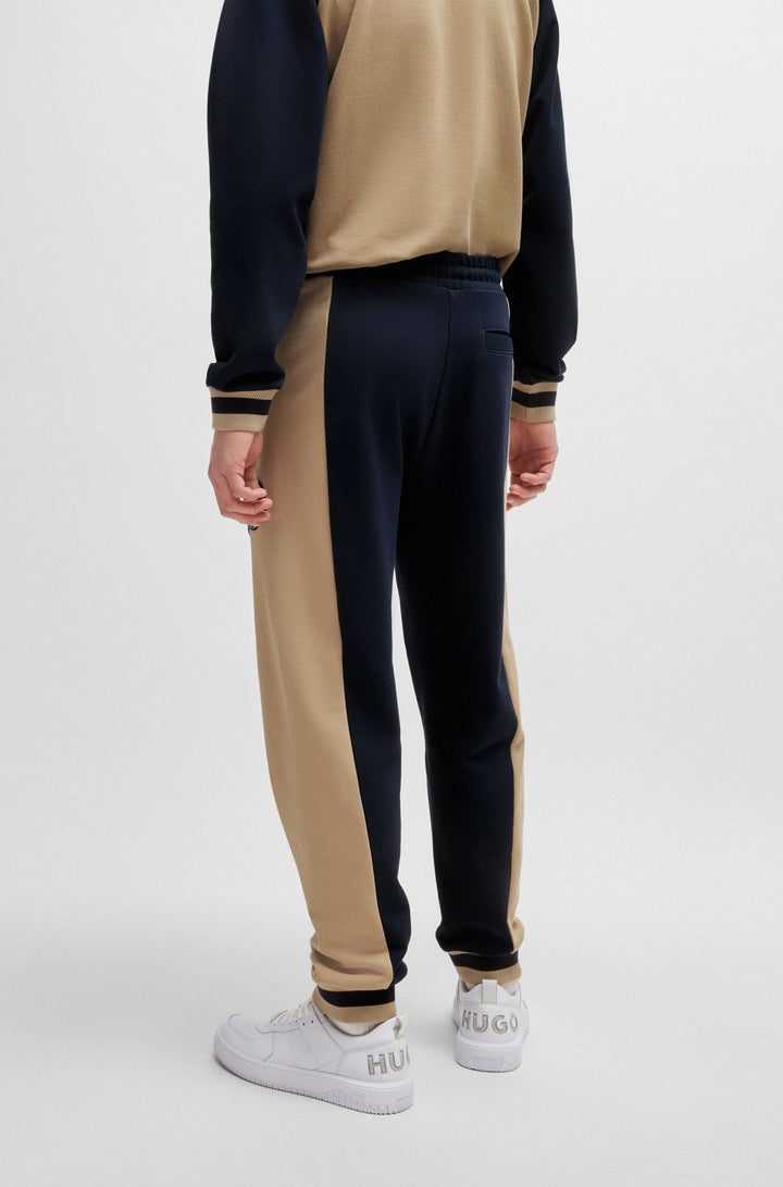 HUGO Jogging Pants Loose Fit in Cotton - NAKITROW 10249110 01-50519790- Concorde Fashion#color_navy-405