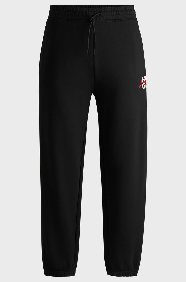 HUGO Jogging Pants Relaxed Fit in Cotton - DLOGOPANTE 10249110 01-50521082- Concorde Fashion#color_black-001