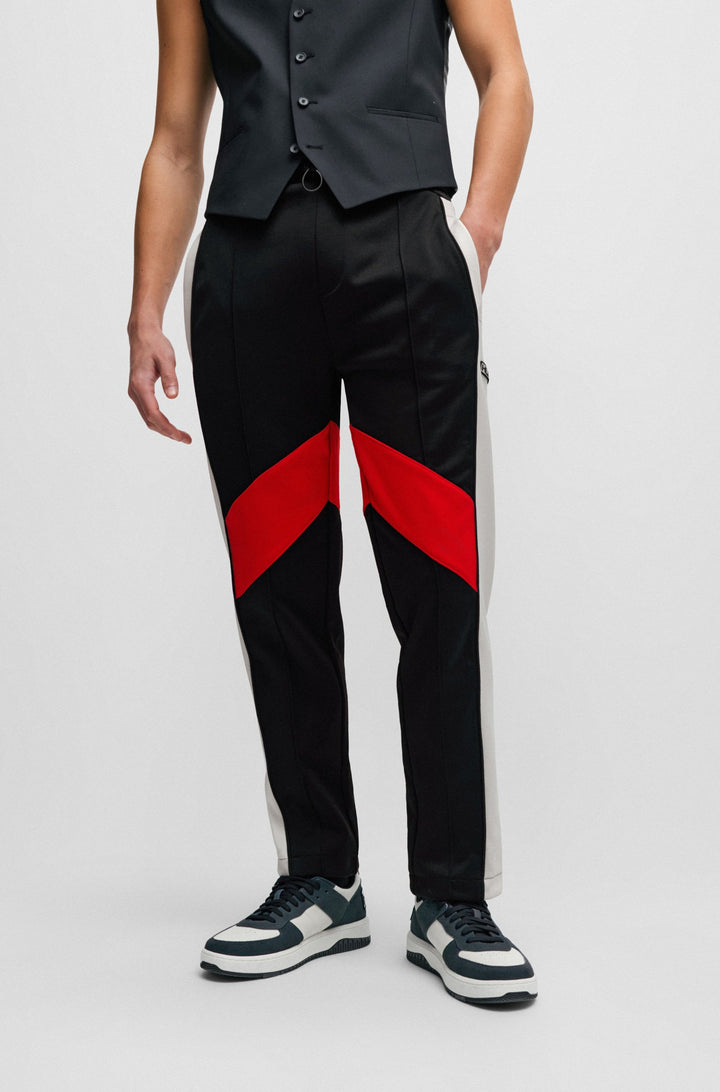 HUGO Relaxed Fit Jogging Pants in Polyester Mix - DENUDE 10249830 01-50512959- Concorde Fashion#color_black-001