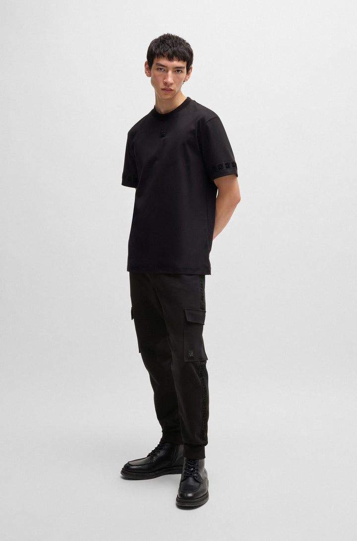 HUGO Jogging Pants Relaxed Fit in Cotton Mix - DISLAND 10254770 01-50521407- Concorde Fashion#color_black-001
