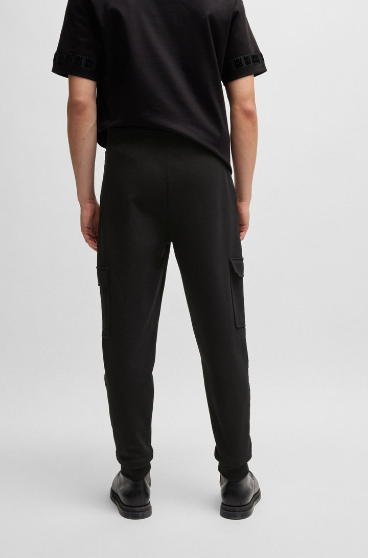HUGO Jogging Pants Relaxed Fit in Cotton Mix - DISLAND 10254770 01-50521407- Concorde Fashion#color_black-001