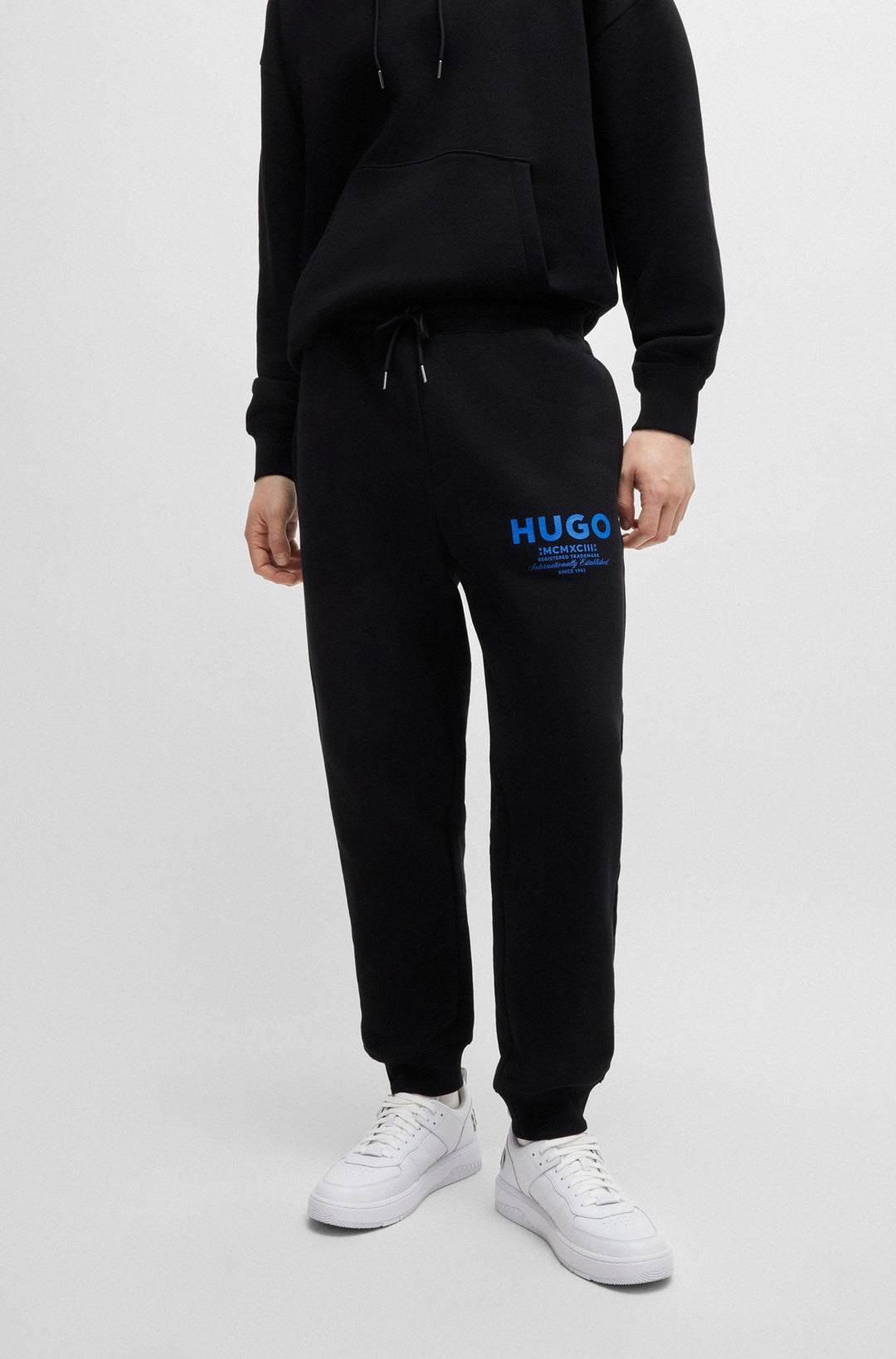 HUGO Jogging Pants Loose Fit in Cotton - NEVEZ 10257685 01-50510734- Concorde Fashion#color_black-001