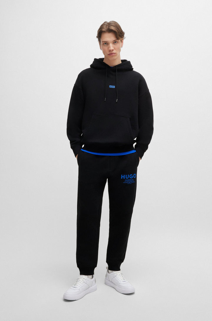 HUGO Jogging Pants Loose Fit in Cotton - NEVEZ 10257685 01-50510734- Concorde Fashion#color_black-001