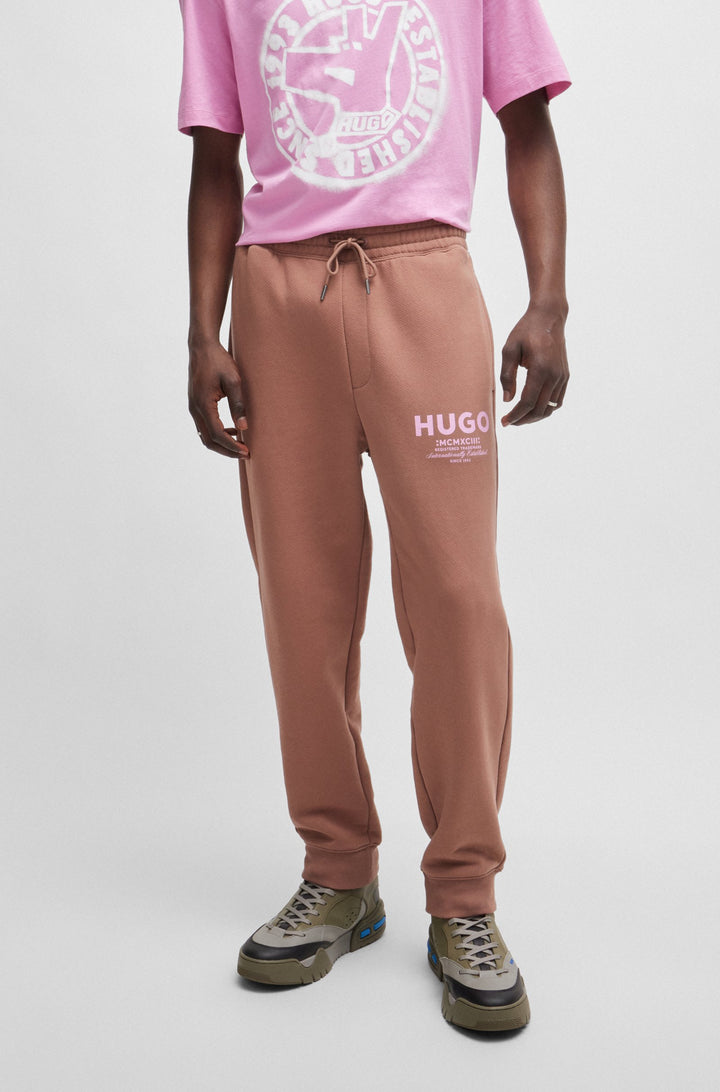 HUGO Jogging Pants Loose Fit in Cotton - NEVEZ 10257685 01-50510734- Concorde Fashion#color_brown-215