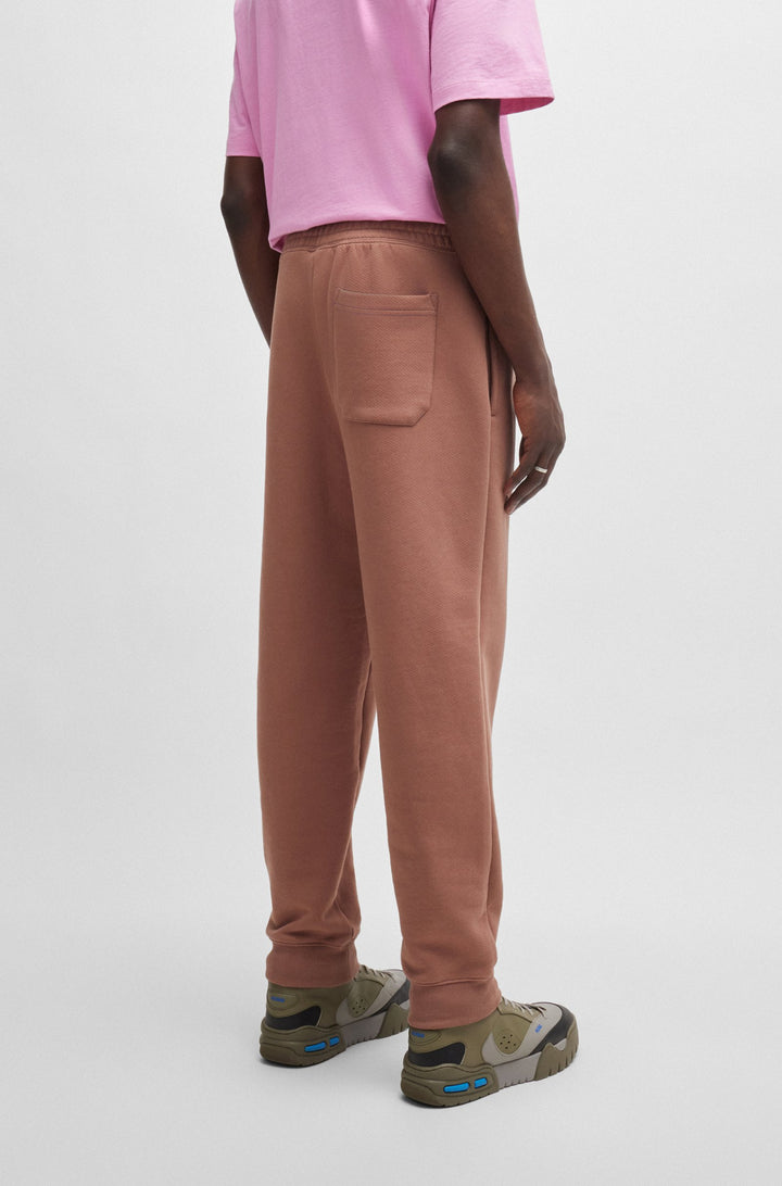 HUGO Jogging Pants Loose Fit in Cotton - NEVEZ 10257685 01-50510734- Concorde Fashion#color_brown-215