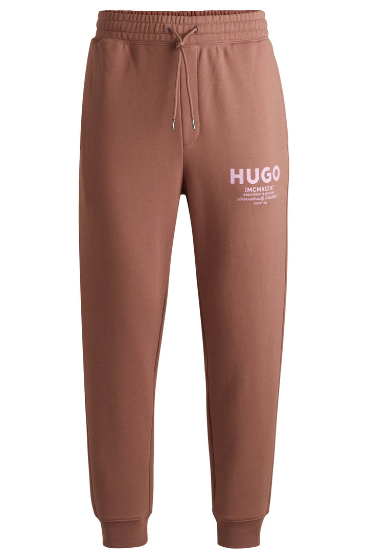 HUGO Jogging Pants Loose Fit in Cotton - NEVEZ 10257685 01-50510734- Concorde Fashion#color_brown-215