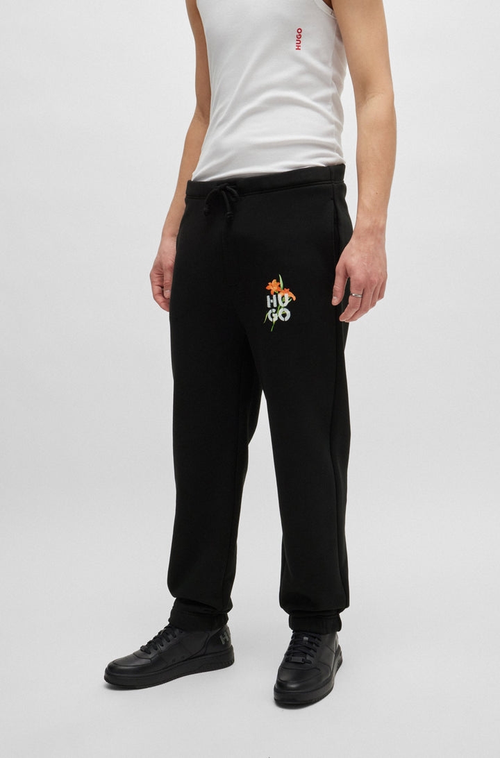 HUGO Jogging Pants Relaxed Fit in Cotton Mix - DIBLOSSYTRO 10262601 01-50517431- Concorde Fashion#color_black-001