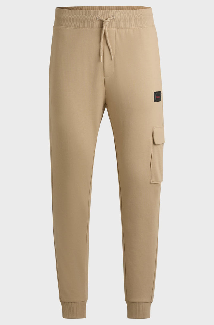 HUGO Jogging Pants Relaxed Fit in Cotton - DWELLROM_GEL 10266045 01-50528176- Concorde Fashion#color_beige-281