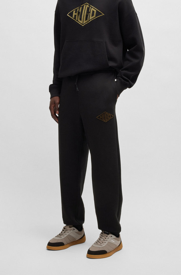 HUGO Jogging Pants Relaxed Fit - DACUSI 50534952- Concorde Fashion#color_black-001