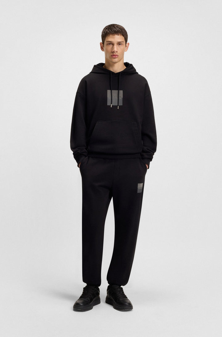 HUGO Jogging Pants Relaxed Fit - DUSPLITAN 50542866Concorde Fashion#color_black-001