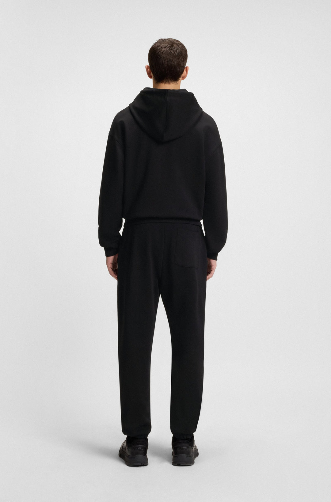 HUGO Jogging Pants Relaxed Fit - DUSPLITAN 50542866Concorde Fashion#color_black-001
