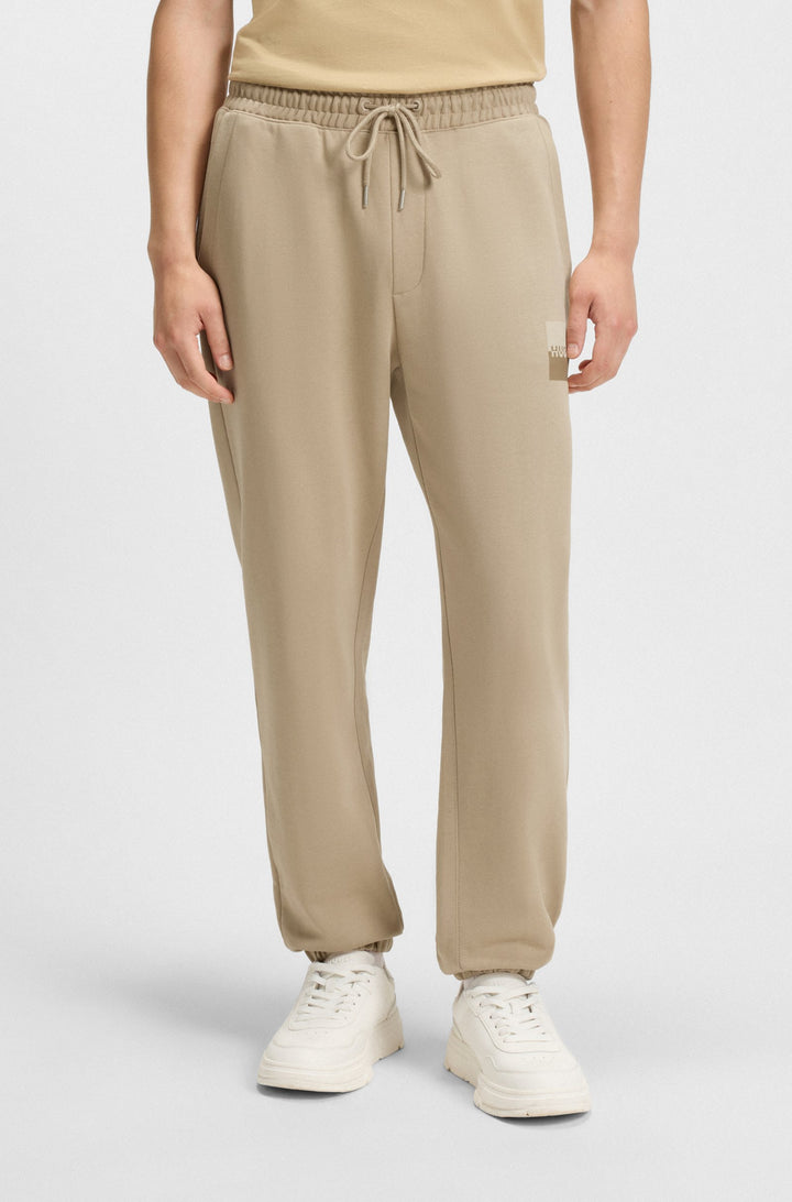 HUGO Jogging Pants Relaxed Fit - DUSPLITAN 50542866Concorde Fashion#color_beige-269
