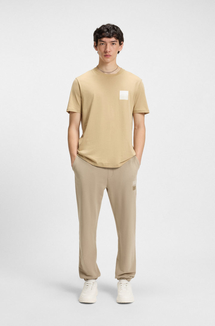 HUGO Jogging Pants Relaxed Fit - DUSPLITAN 50542866Concorde Fashion#color_beige-269