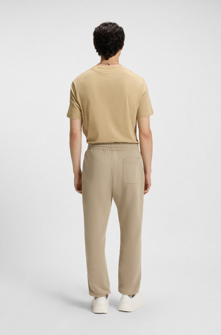 HUGO Jogging Pants Relaxed Fit - DUSPLITAN 50542866Concorde Fashion#color_beige-269