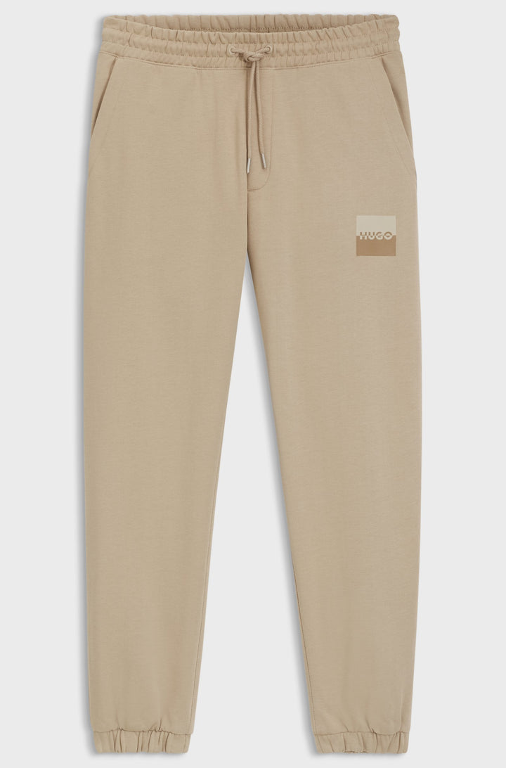 HUGO Jogging Pants Relaxed Fit - DUSPLITAN 50542866Concorde Fashion#color_beige-269
