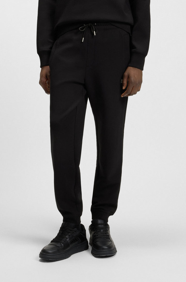 HUGO Jogging Pants Relaxed Fit - DIMACS 50533695Concorde Fashion#color_black-001