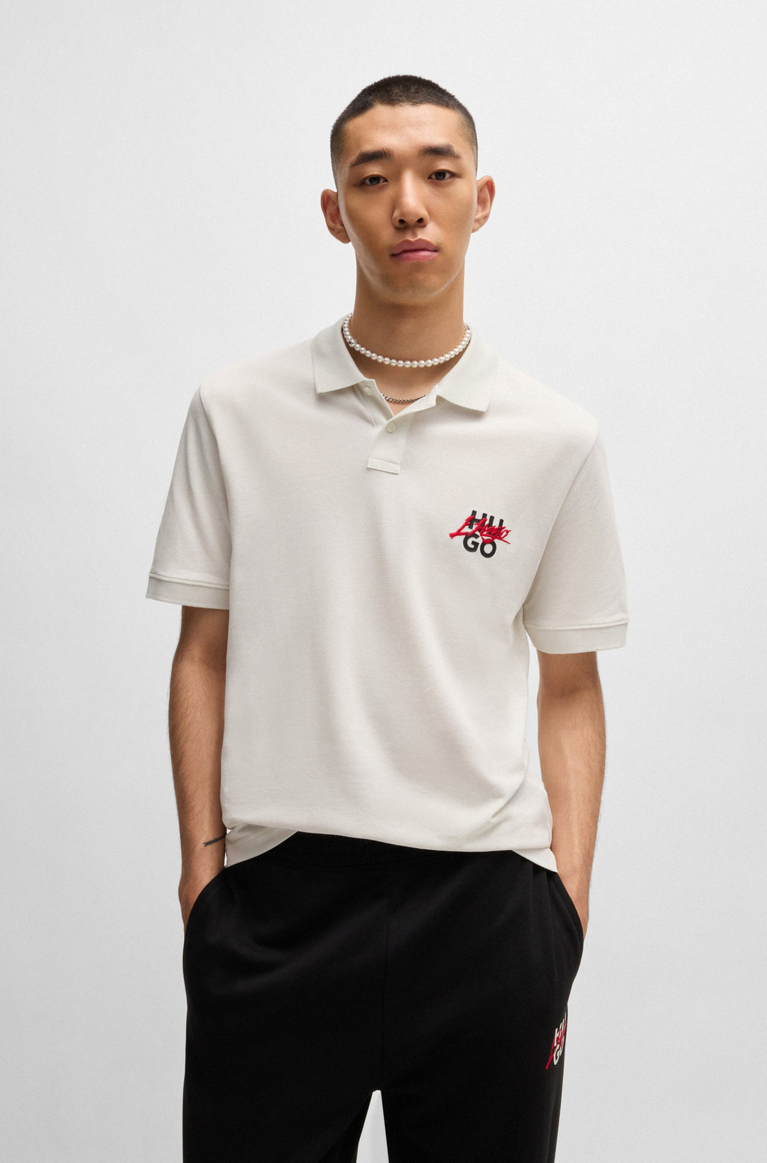HUGO Polos Relaxed Fit in Cotton - DALOGPOLO 10267961 01-50533657- Concorde Fashion#color_white-101