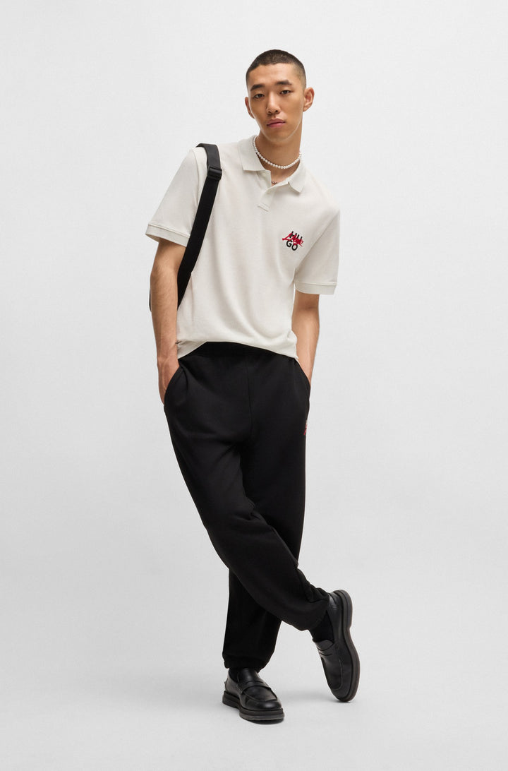 HUGO Polos Relaxed Fit in Cotton - DALOGPOLO 10267961 01-50533657- Concorde Fashion#color_white-101